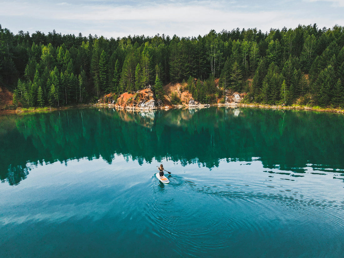 Paddleboarding on scenic lake