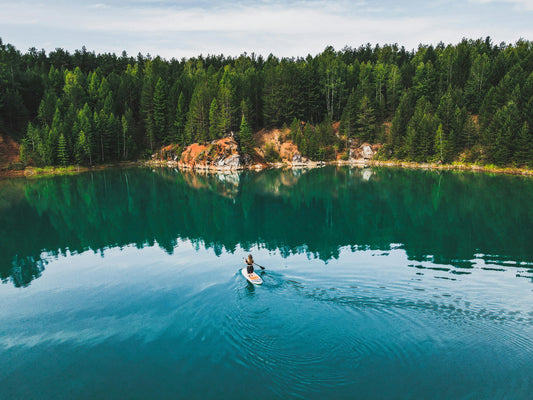 Paddleboarding on scenic lake